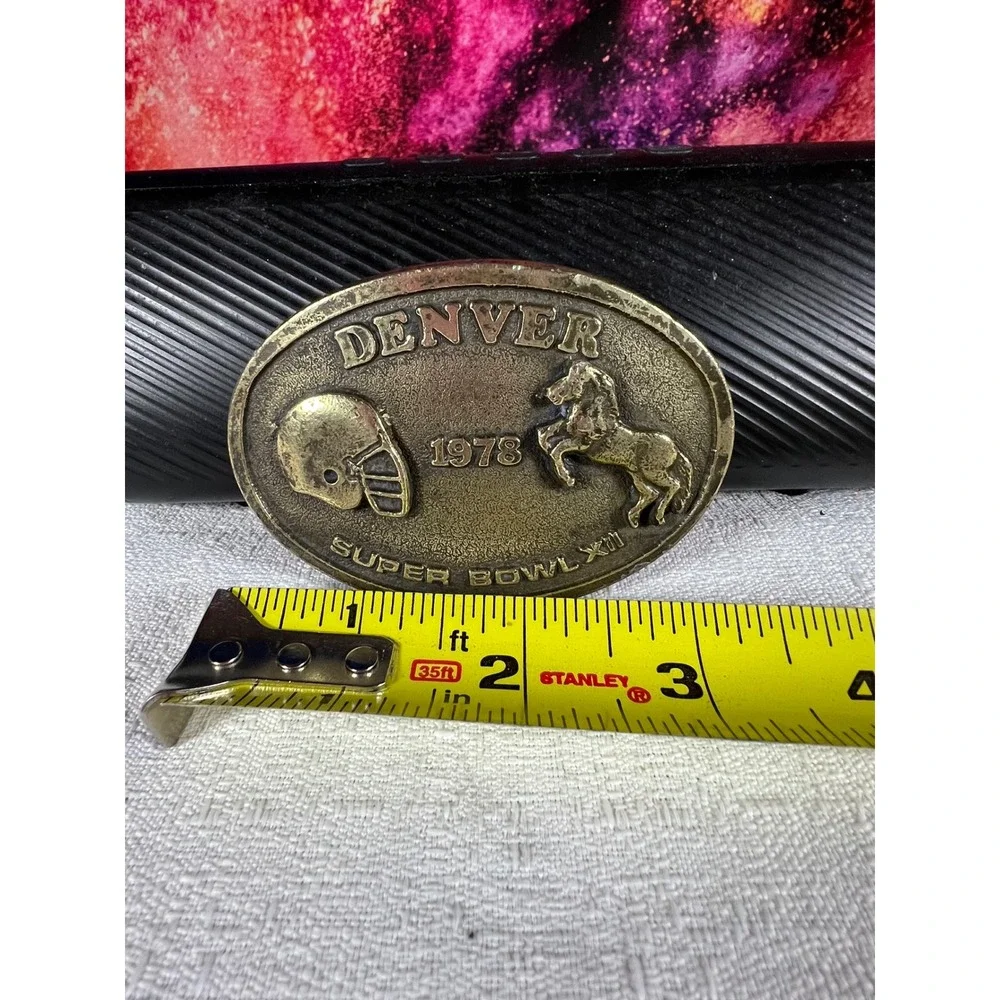 Vintage 1978 Denver Super Bowl XII Belt Buckle Sanchez International Brass Oval